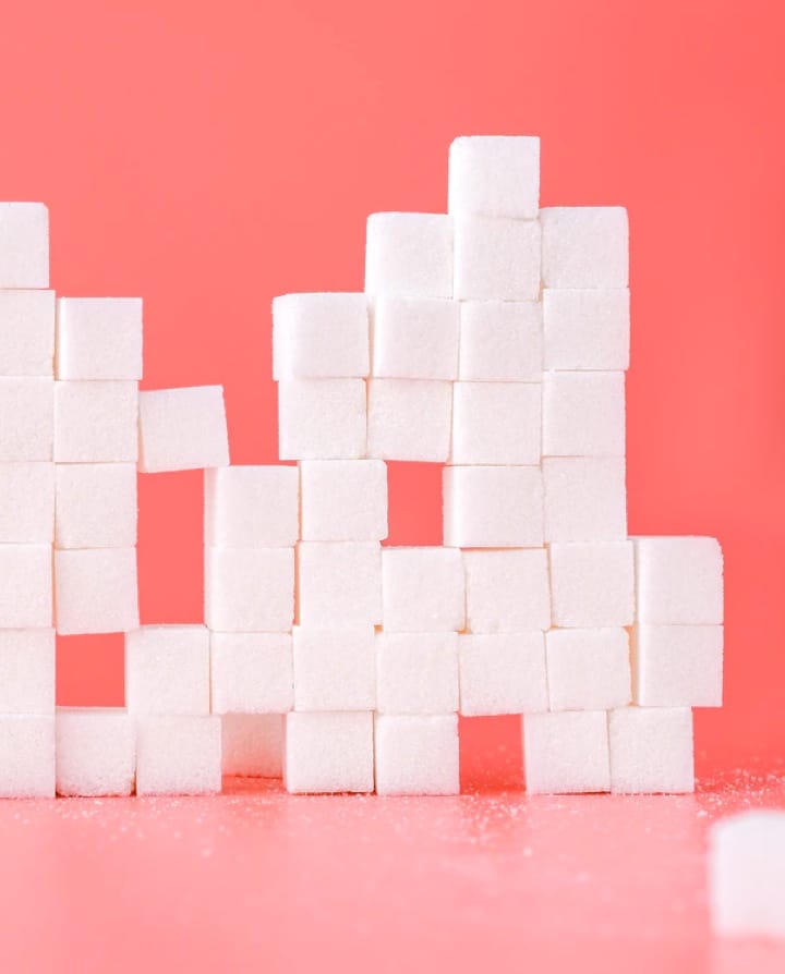 Bunch of sugarcubes stacked over one another.